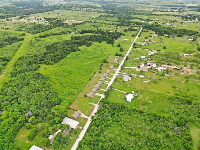 birds eye view of property featuring a rural view