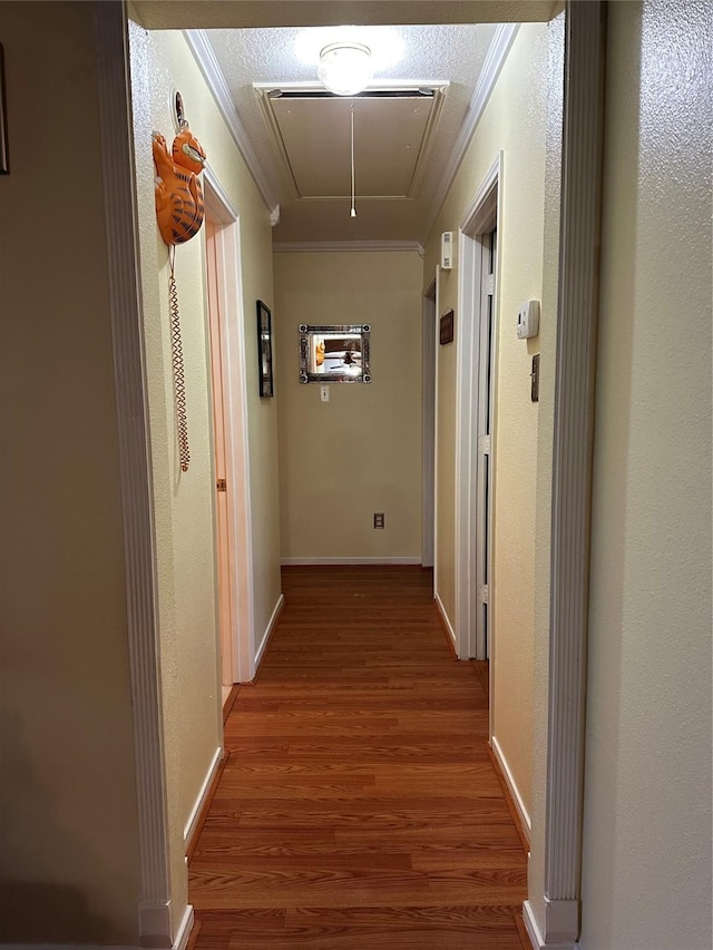 4060 Dubuque Pkwy, Rosharon, TX 77583 - corridor featuring ornamental molding, attic access, and wood finished floors