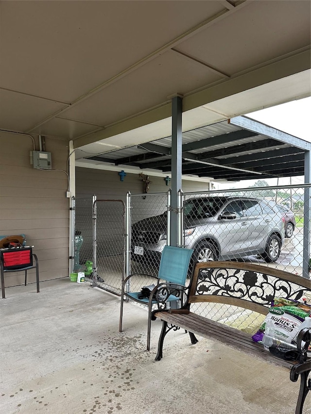 4060 Dubuque Pkwy, Rosharon, TX 77583 - view of patio / terrace featuring fence and a carport