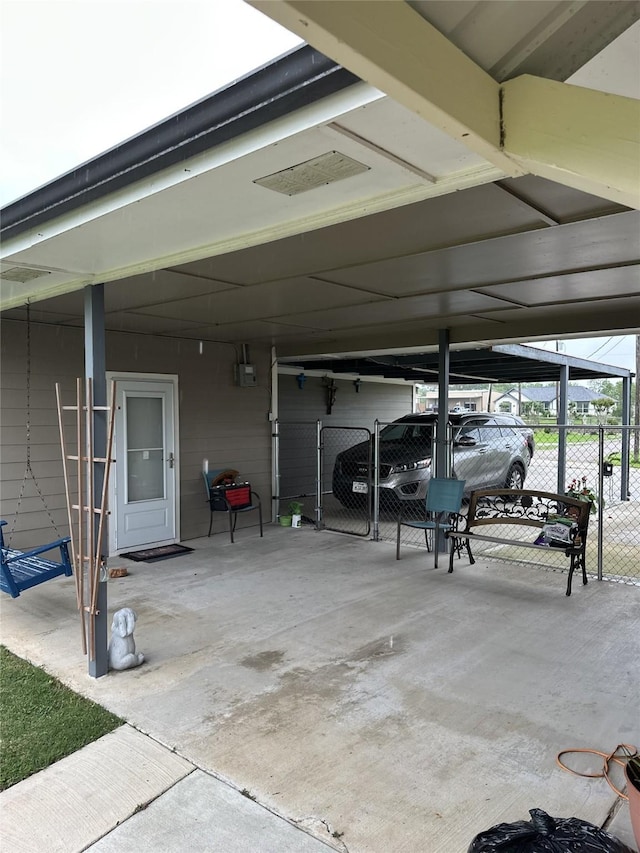4060 Dubuque Pkwy, Rosharon, TX 77583 - view of car parking with fence and a carport