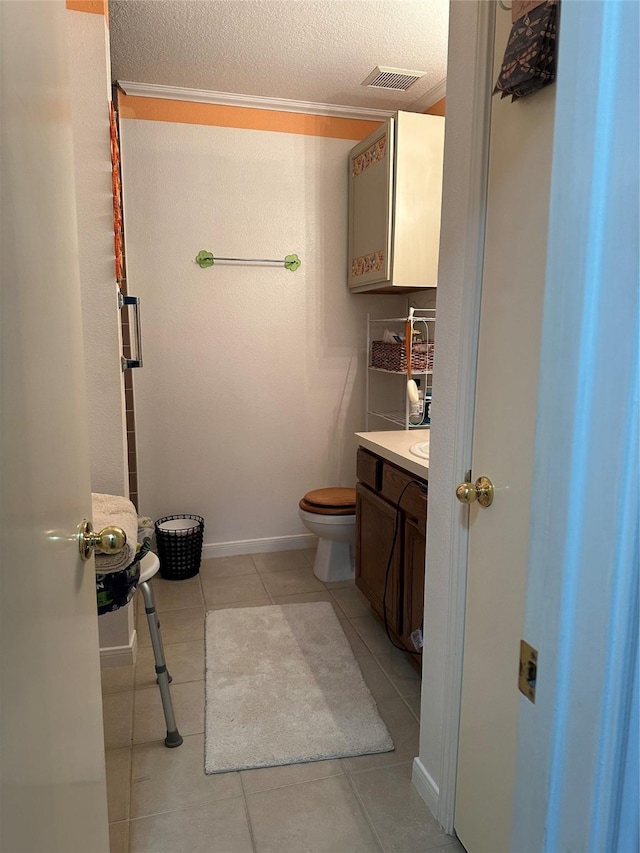 4060 Dubuque Pkwy, Rosharon, TX 77583 - bathroom with visible vents, tile patterned flooring, toilet, and vanity