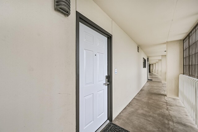 view of exterior entry featuring visible vents