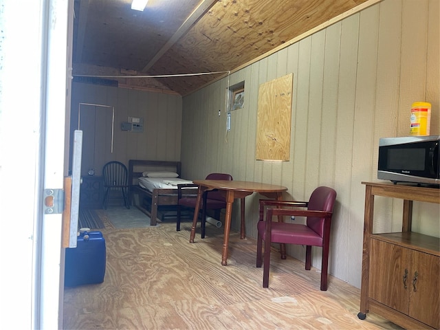 interior space featuring wood walls