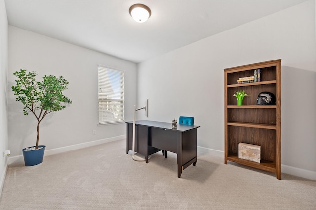 office area with baseboards and light colored carpet