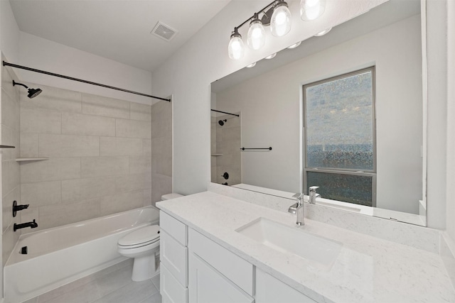 full bathroom featuring tile patterned flooring, vanity, shower / bathtub combination, toilet, and visible vents
