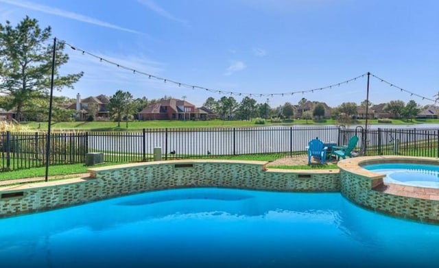 view of swimming pool with an in ground hot tub, a fenced in pool, and a fenced backyard