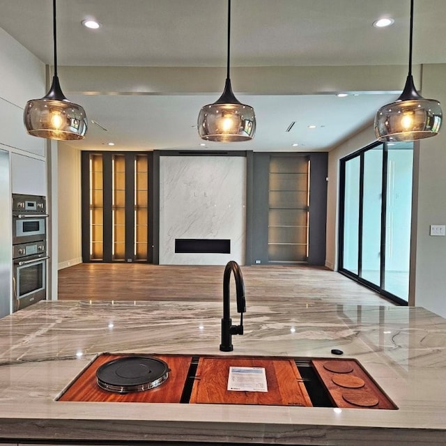 1014 Gardenia Dr, Houston, TX 77018 - kitchen featuring double oven, pendant lighting, and recessed lighting