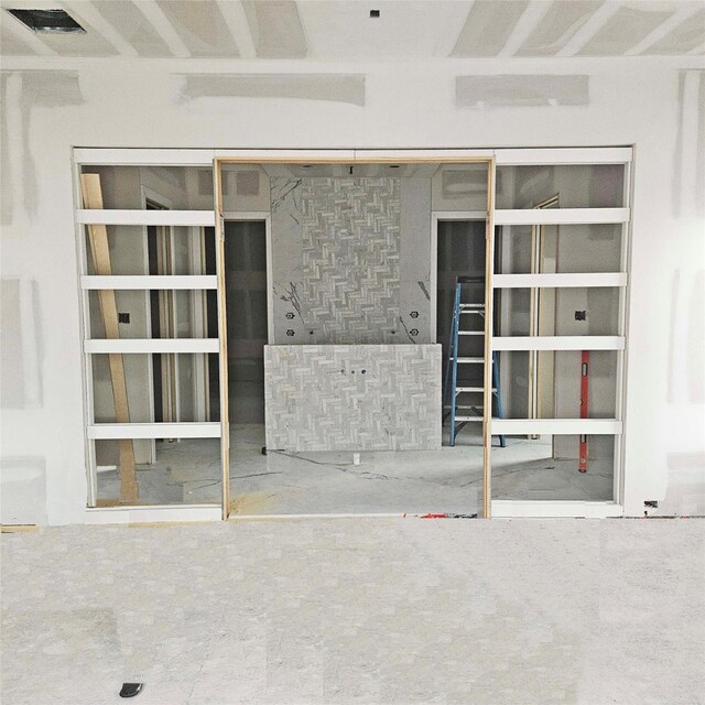 property entrance with visible vents