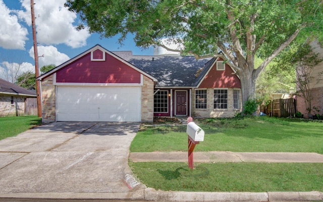 view of front of house featuring fence, an attached garage, a shingled roof, a front lawn, and concrete driveway