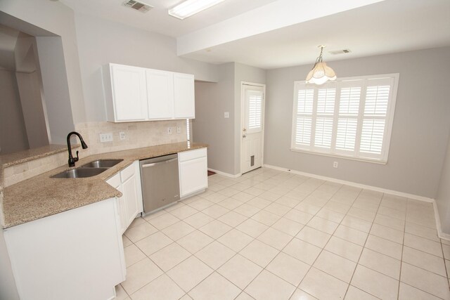 kitchen with a sink, decorative backsplash, visible vents, and dishwasher