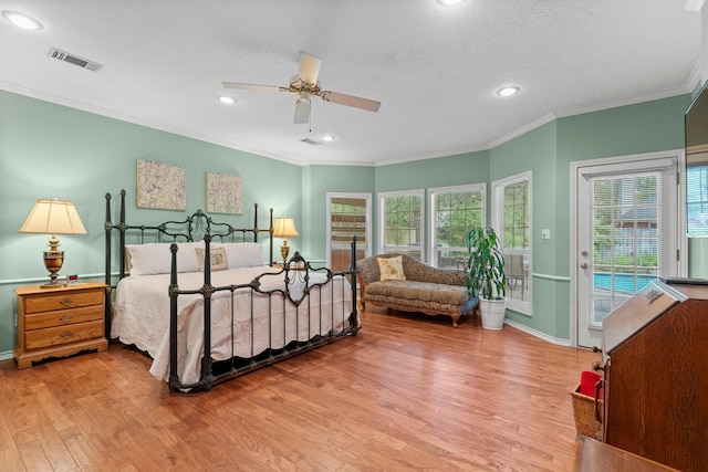 bedroom with baseboards, access to outside, ornamental molding, and wood finished floors