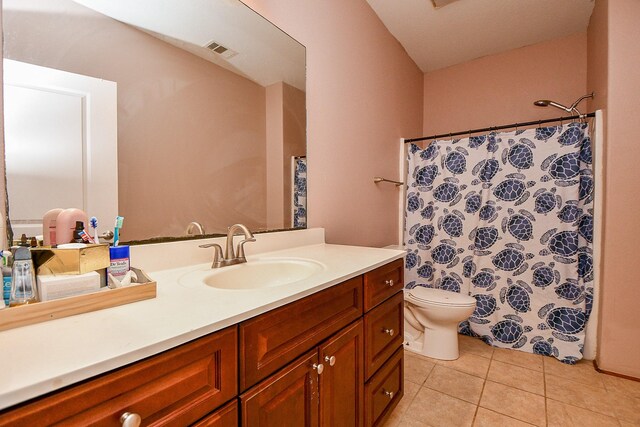 full bathroom featuring vanity, toilet, tile patterned floors, a shower with curtain, and visible vents