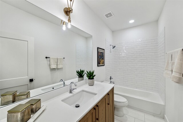 bathroom featuring visible vents, vanity, toilet, recessed lighting, and  shower combination
