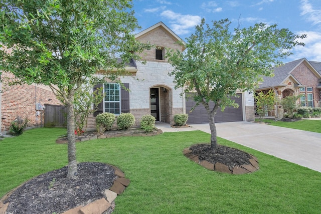 french country style house featuring driveway, brick siding, fence, a front lawn, and stone siding