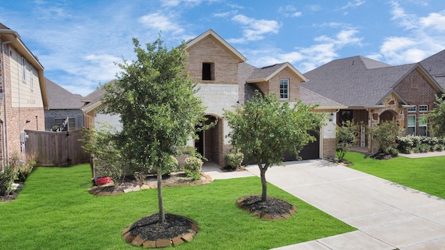 view of front of property featuring stone siding, a front lawn, and brick siding
