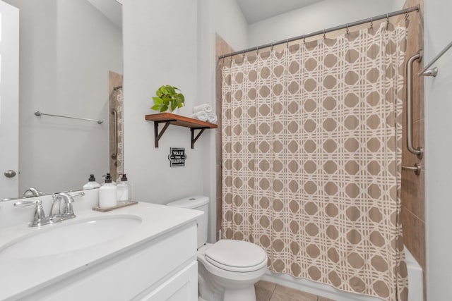 full bathroom with tile patterned floors, shower / bath combo with shower curtain, vanity, and toilet
