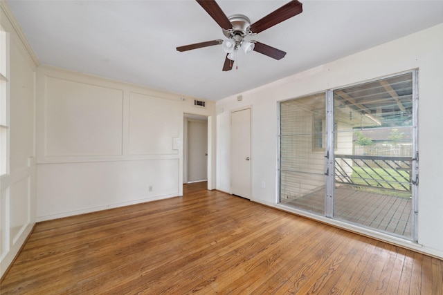 unfurnished bedroom with light wood-style floors, ceiling fan, access to exterior, and visible vents