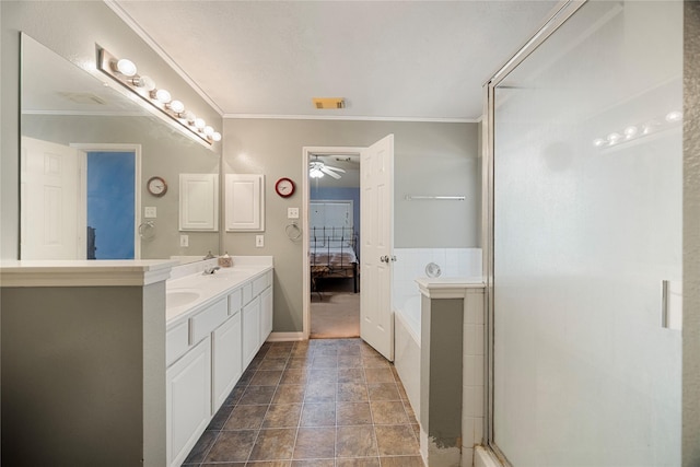 full bathroom featuring visible vents, ornamental molding, double vanity, ceiling fan, and a stall shower