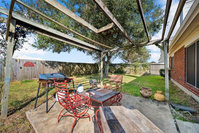 view of patio / terrace featuring a pergola and a fenced backyard