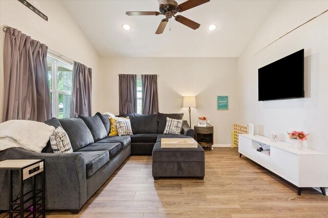 living room with recessed lighting, ceiling fan, and lofted ceiling