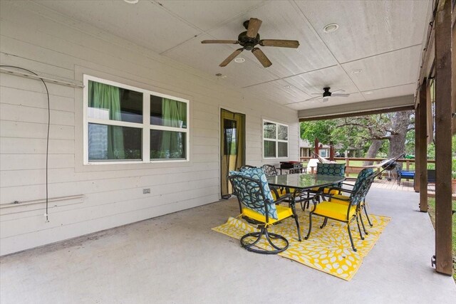 view of patio / terrace with outdoor dining space and ceiling fan