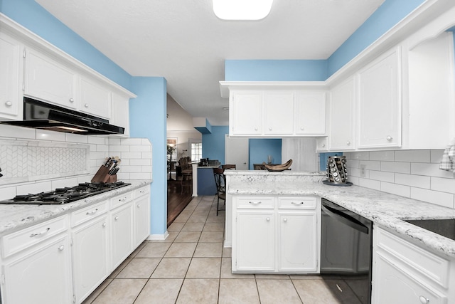 kitchen featuring a peninsula, light tile patterned flooring, under cabinet range hood, white cabinets, and black appliances