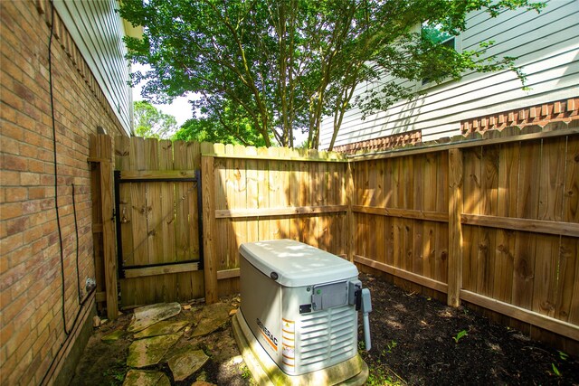 details with a power unit, fence, and a gate