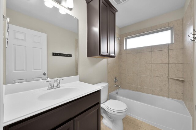 full bath with vanity, shower / bathing tub combination, tile patterned floors, and toilet