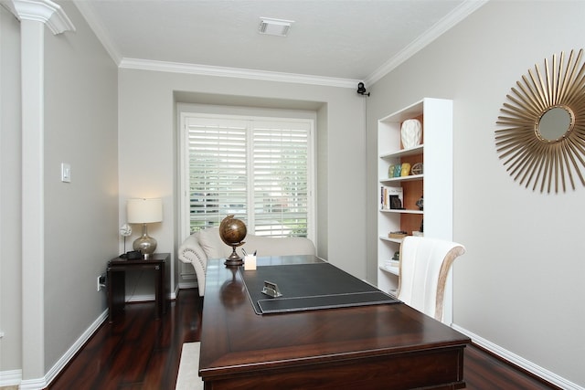 office area with baseboards, dark wood finished floors, ornamental molding, and visible vents