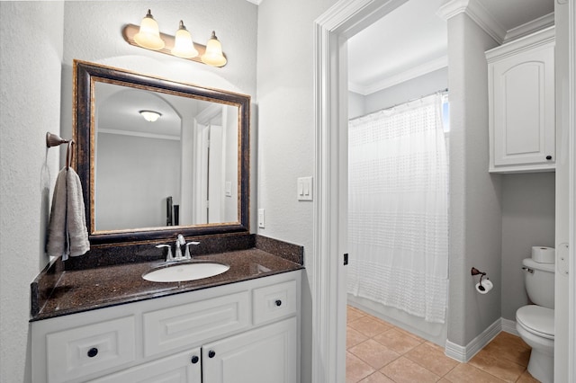 33026 Sawgrass Ct, Magnolia, TX 77354 - bathroom featuring vanity, toilet, tile patterned floors, baseboards, and ornamental molding