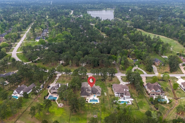 33026 Sawgrass Ct, Magnolia, TX 77354 - drone / aerial view with a residential view, a water view, and a wooded view