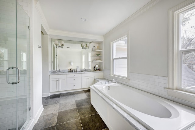 full bath featuring crown molding, plenty of natural light, a shower stall, and a sink
