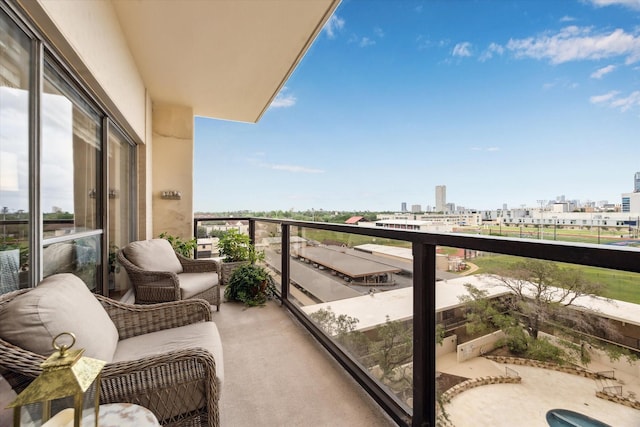 balcony featuring a view of city