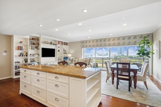 2929 Buffalo Speedway Unit A601, Houston, TX 77098 - kitchen with open shelves, light stone counters, dark wood-style floors, white cabinets, and a center island