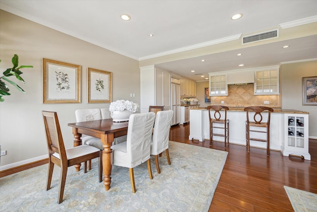 2929 Buffalo Speedway Unit A601, Houston, TX 77098 - dining space with wood finished floors, recessed lighting, and ornamental molding