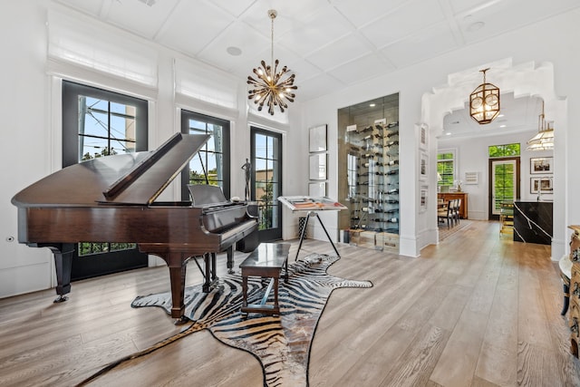 81 Crain Square Blvd, West University Place, TX 77025 - sitting room featuring an inviting chandelier, wood-type flooring, and coffered ceiling