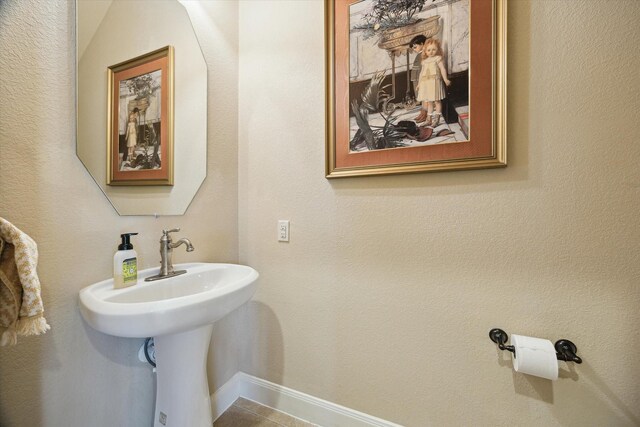 bathroom featuring baseboards