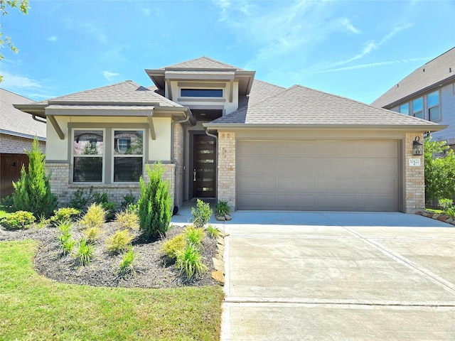 10422 Rigel Ridge Way, Richmond, TX 77406 - prairie-style home featuring driveway, an attached garage, roof with shingles, stucco siding, and brick siding