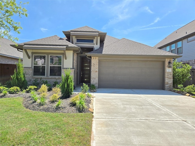 10422 Rigel Ridge Way, Richmond, TX 77406 - prairie-style house with brick siding, driveway, an attached garage, a front lawn, and roof with shingles