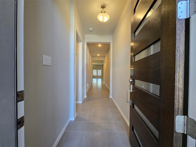 10422 Rigel Ridge Way, Richmond, TX 77406 - hallway with tile patterned floors and baseboards