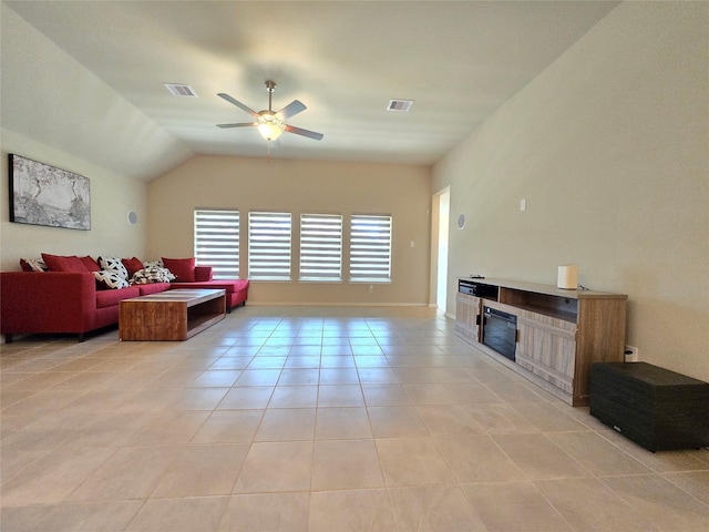 10422 Rigel Ridge Way, Richmond, TX 77406 - living area with light tile patterned floors, a ceiling fan, and lofted ceiling