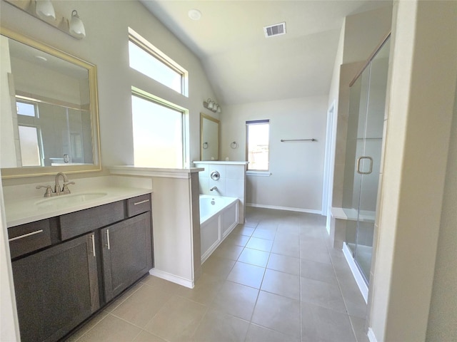 10422 Rigel Ridge Way, Richmond, TX 77406 - bathroom with tile patterned flooring, lofted ceiling, a stall shower, a bath, and vanity