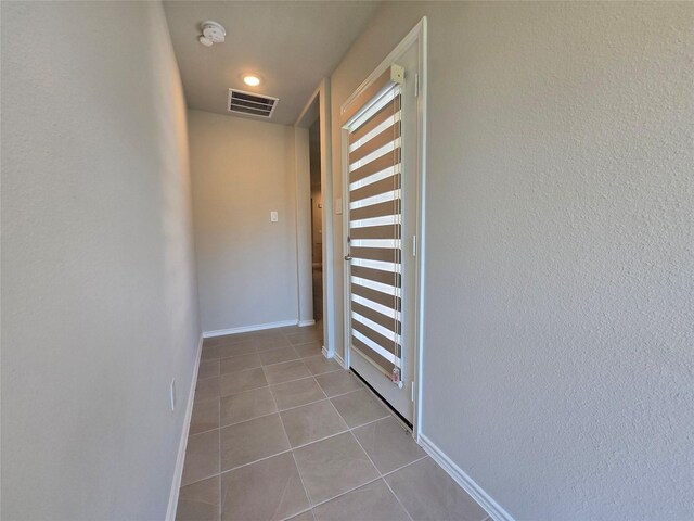 10422 Rigel Ridge Way, Richmond, TX 77406 - corridor featuring tile patterned flooring and baseboards
