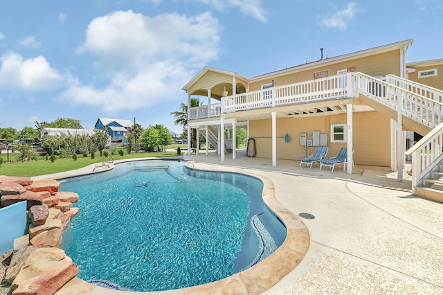 1004 8th St, San Leon, TX 77539 - pool with a patio, stairway, and a deck
