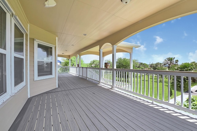 1004 8th St, San Leon, TX 77539 - wooden deck with a yard
