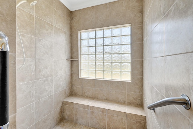1004 8th St, San Leon, TX 77539 - full bathroom with a tile shower and ornamental molding