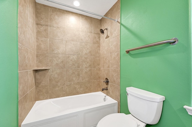 1004 8th St, San Leon, TX 77539 - bathroom with toilet, recessed lighting, and shower / bathing tub combination