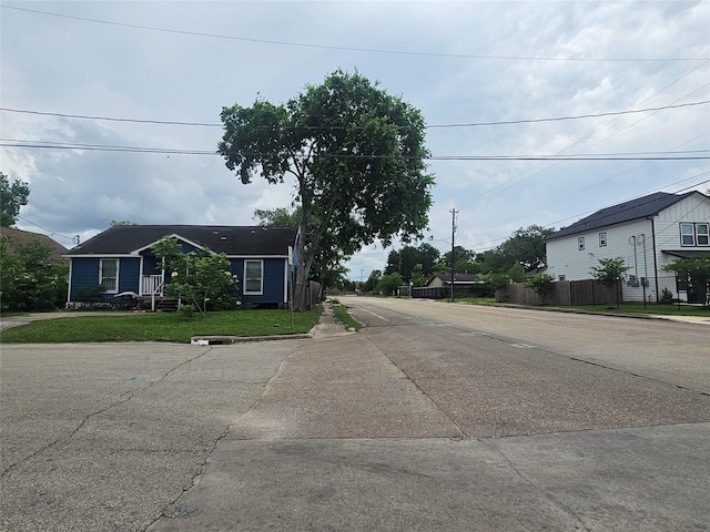 view of street featuring curbs and sidewalks