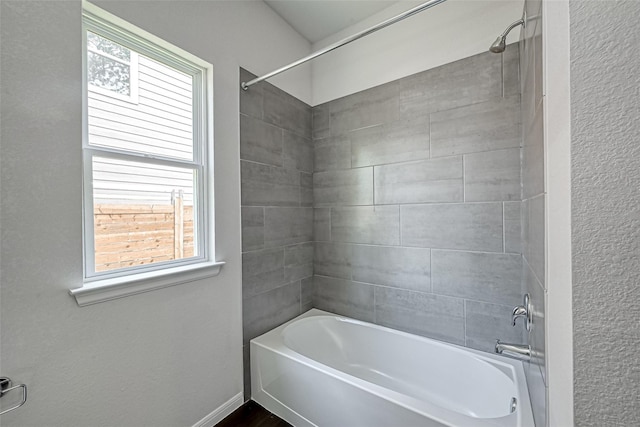 full bath featuring bathing tub / shower combination