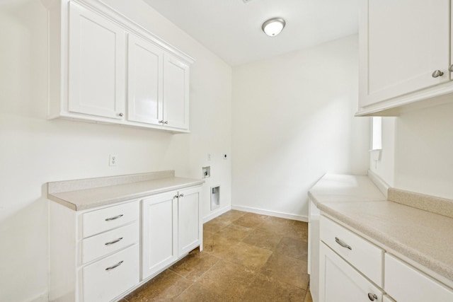 laundry room with cabinet space, baseboards, and hookup for a washing machine